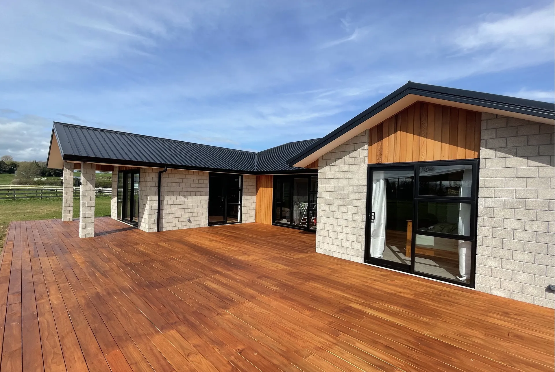 Rear view with timber deck and rural outlook