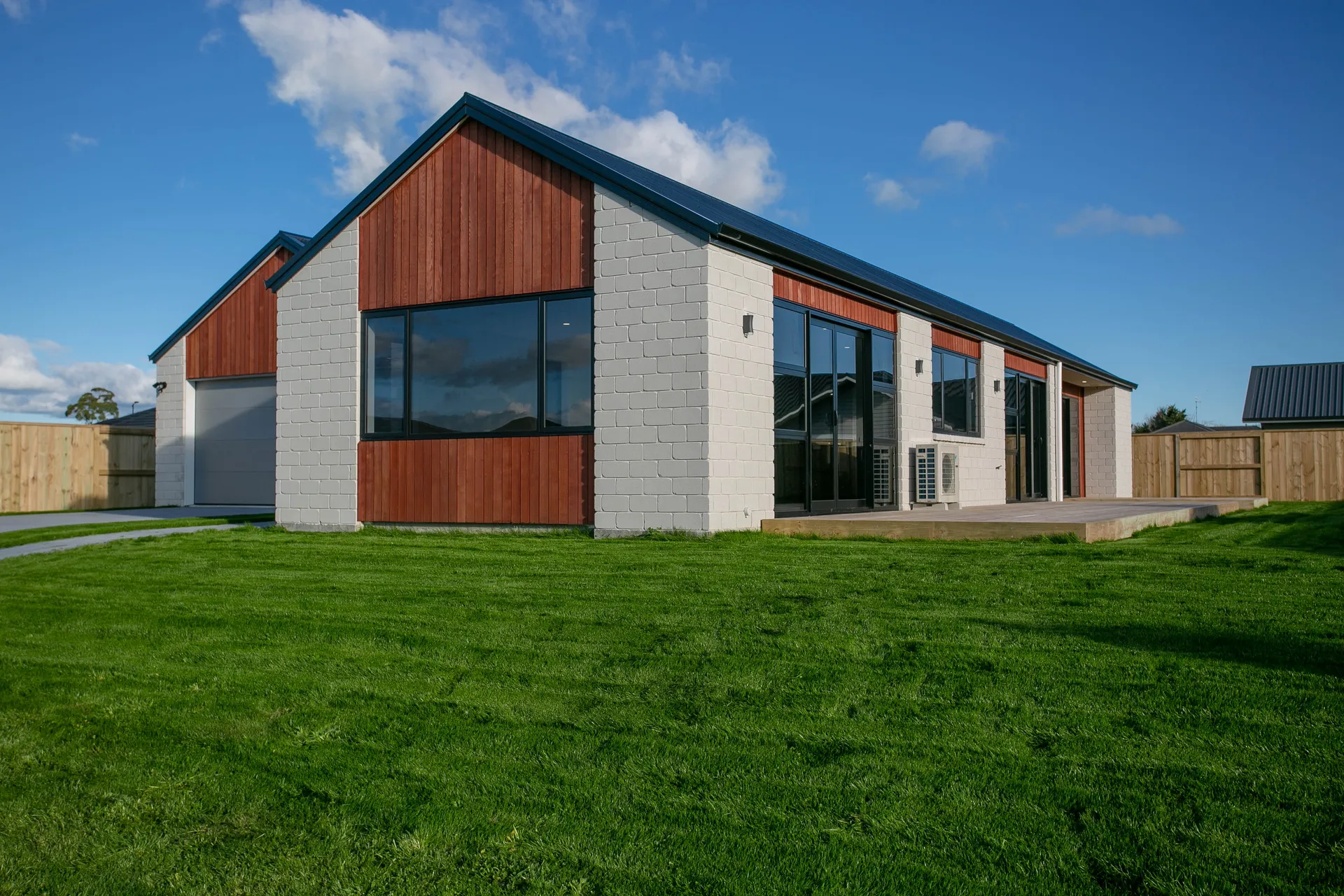 Rear view with block and cedar cladding